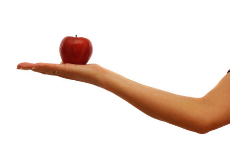 A lady offering an apple symbol of the beginningの写真素材