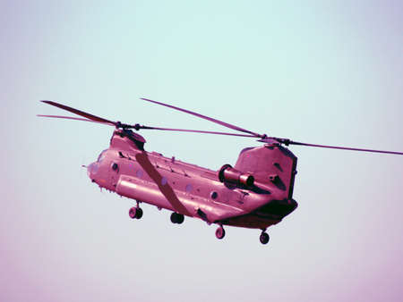 Chinook helicopter taking off and transporting troops     の写真素材