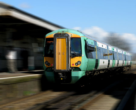 Urban train taking commuters to work quickly