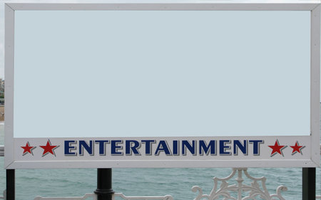 Bill board on pier showing entertainment eventsの写真素材