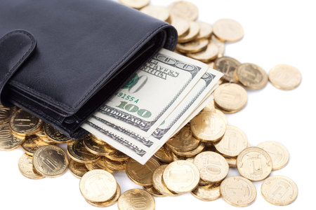 Black leather wallet with dollars and golden coins on white