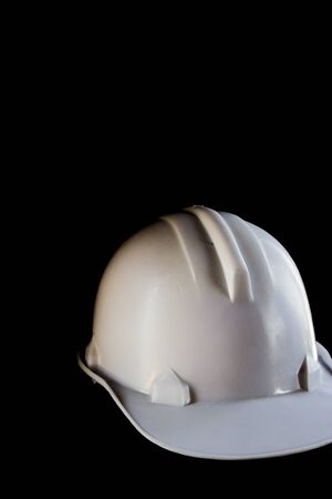 Hard hat on the black background.の写真素材