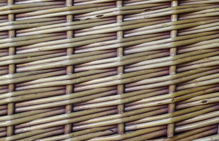 basket wicker texture crisscrossed pattern in detail violet brownの写真素材