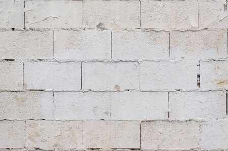 large brick wall cement background remains gray paint grungeの写真素材