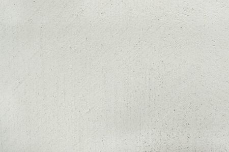 Micro cement fine texture light gray continuous coating indoor wallの写真素材