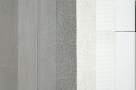 different microcement application layers above tile microtopping coating  meshの写真素材