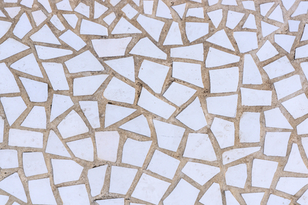 Pattern of broken white tiles, brittle, mosaic, trencadis breakable, front view, enamelled ceramics glazedの写真素材