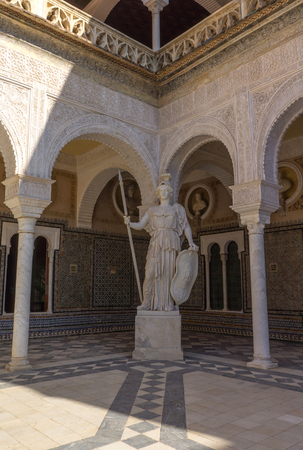 Courtyard of Casa de Pilatos Seville, Spain, imitation of antique statue of Athena in the 16th century Goddess athenaの写真素材