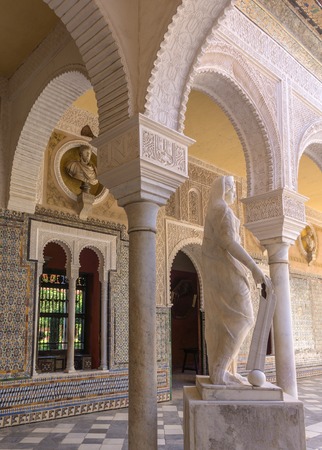 Courtyard of Casa de Pilatos Seville, Spain, imitation of antique statue of Athena in the 16th centuryの写真素材