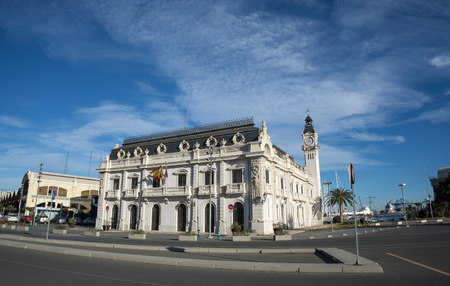 Port Authority buildings with clock tower in Valencia harbor, Spain, wide angleの写真素材