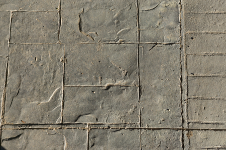 Stamped concrete slate end of the pattern, expansion joint on the right and down movement joint, pavement outdoor with decorative appearance colors and textures of paving slate stone tile top viewの写真素材