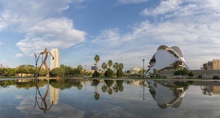 Valencia, Spain - November 8, 2016: Park in the old dry riverbed, River Turia gardens Jardin del Turia, leisure and sport area in Camins al Grau district, Gigapan reflection in the water - Europeのeditorial素材