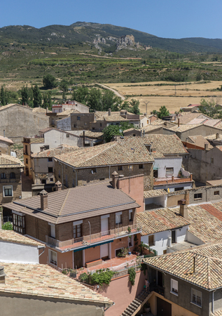 Aereal views of the village of Loarre Aragon Huesca Spain, the main square, the inn and the town hall, old houses, narrow streets, on the right in the background the Loarre Castleの写真素材