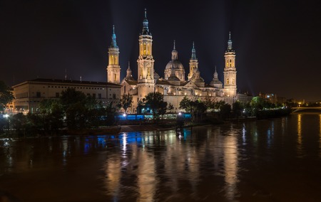 Basilica Cathedral Pilar Zaragoza Aragon Spain night illumination, water reflection Ebro riverの写真素材