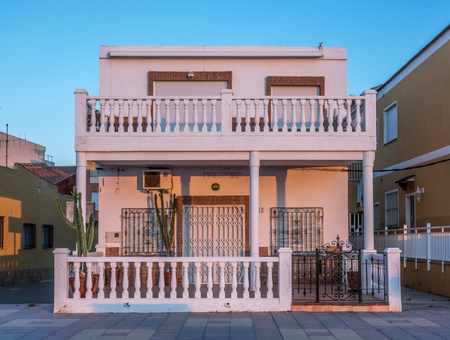 typical mediterranean house Spain coast town, facade of two-story house dwellingの写真素材