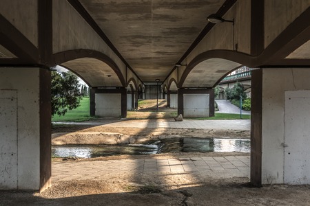 Perspective construction from under the bridge architecture symmetryの写真素材