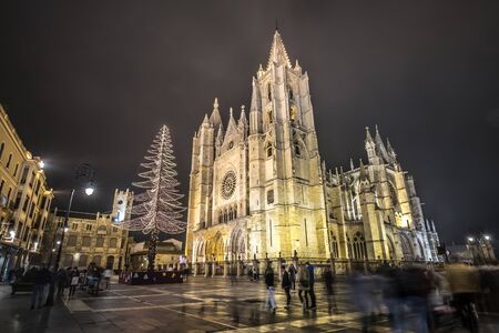 Leon Gothic cathedral rainy night reflections in the water, christmas tree and lights, Castilla Leon Spainの写真素材