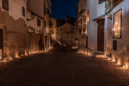 Titaguas village, streets illuminated by candles drawing shapes on the night of the candles celebration local july festival at Valencia Spainの写真素材