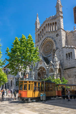 Soller, Spain - May 4, 2017: Historic Tram of the Soller Tramway line driving in a street in Mallorcaのeditorial素材