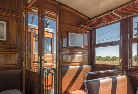 Historic train Tram between Soller and Palma with views over the Soller villageの写真素材