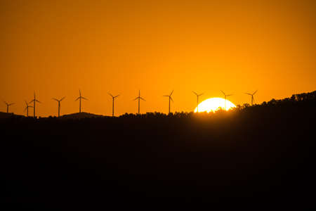 Windmill farm renewable energies wind sustainable economyの写真素材