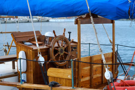 old ship wooden rudder traditional nautical steering wheelの写真素材