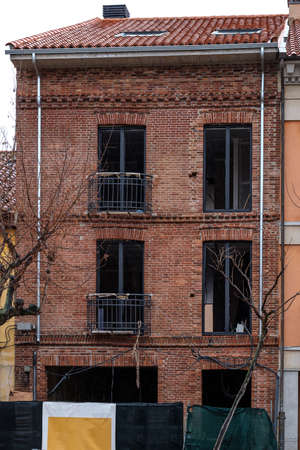 rehabilitation of old building, being renovated and refurbished, family dwellings in flats of european cityの写真素材