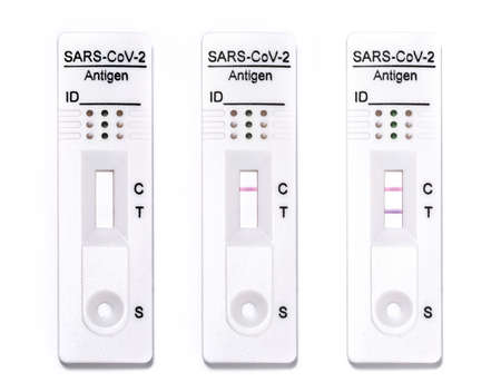 COVID-19 rapid test antigens null, negative and positive results reagent based on immunochromatography of antibodies to detect infectionsの写真素材