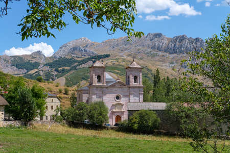 Lois Church Cathedral Mountain, Cremenes Leon, Spain. Veined Red Marble Limestone Facadeの写真素材