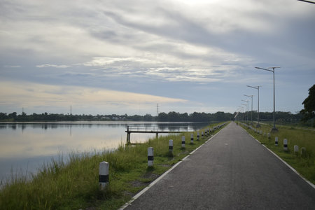 Landscape view of a road at the river in the evening.