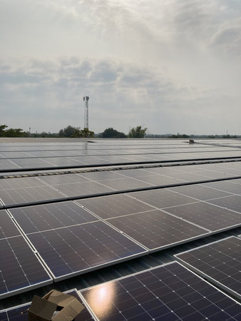 Solar energy panels on the roof of a power plant in Thailand.