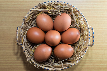 Eggs on wooden background