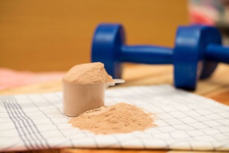 whey protein and dumbellの写真素材