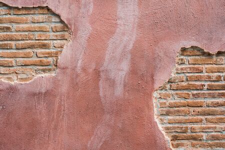cracked concrete vintage brick wall background.with space for textの写真素材