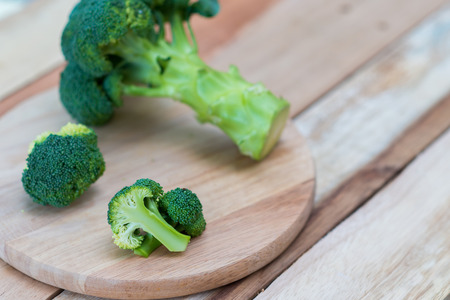 Fresh broccoli on wooden background,broccoli wooden tableの写真素材