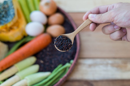 clean food,vegetables set ,wood dish and wood fork on wooden tableの写真素材