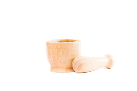 Handmade wooden mortar isolated on white backgroundの写真素材