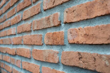 Background of old vintage brick wallの写真素材