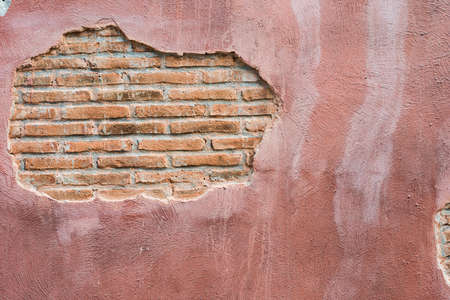 cracked concrete vintage brick wall background.with space for textの写真素材