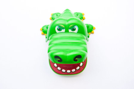 The green crocodile model toy open the mouth の写真素材