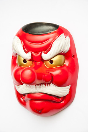 Japanese demon mask on white backgroundの写真素材