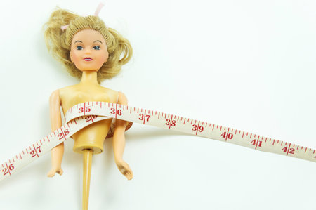 Women plastic doll with measuring tape