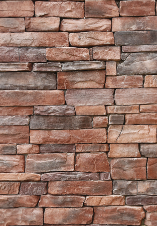 Pattern of old red stone Wallの写真素材