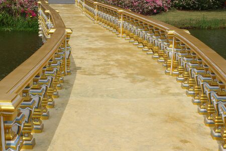 gold stone  bridge in thailandの写真素材