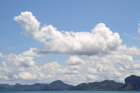 cloudy sky and seascape island in krabi thaialndの写真素材