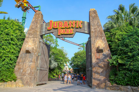 Sentosa, Singapore - APRIL 12, 2016 : The big gate in front of Jurassic Park theme at Universal Studio Singaporeのeditorial素材