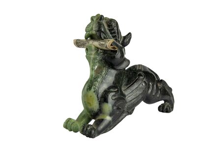 Jade Pixiu is Chinese lucky animal of china eat dollar on white background have pathの写真素材