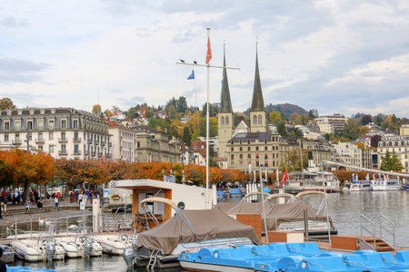 Lucerne, Switzerland-October 18, 2019: View of cityscape and Hofkirche is old city near the river in Lucerne, Switzerlandのeditorial素材