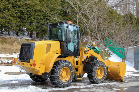Yellow Snow loader big car on the snow garden at japan  