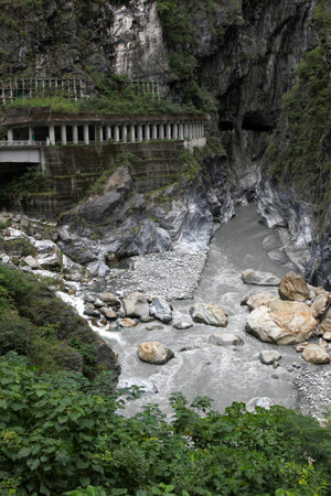 Dark river in taroko national park after rain storm in taiwan.の写真素材